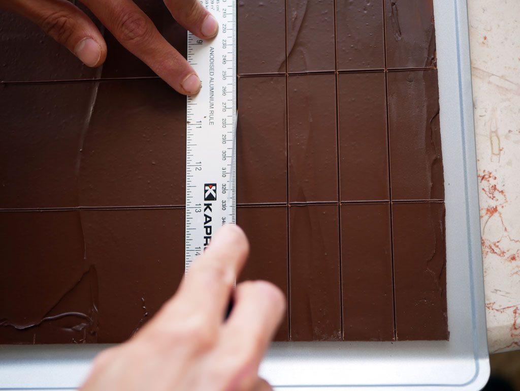 Cutting chocolate sheets for Plaisir sucré