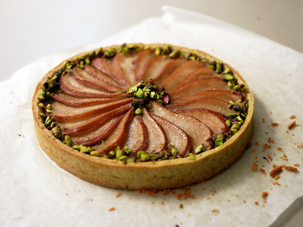 Pistachio tart with poached pears