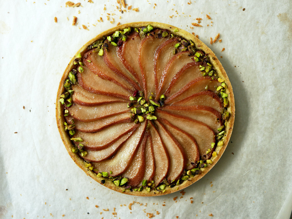 Pistachio tart with poached pears