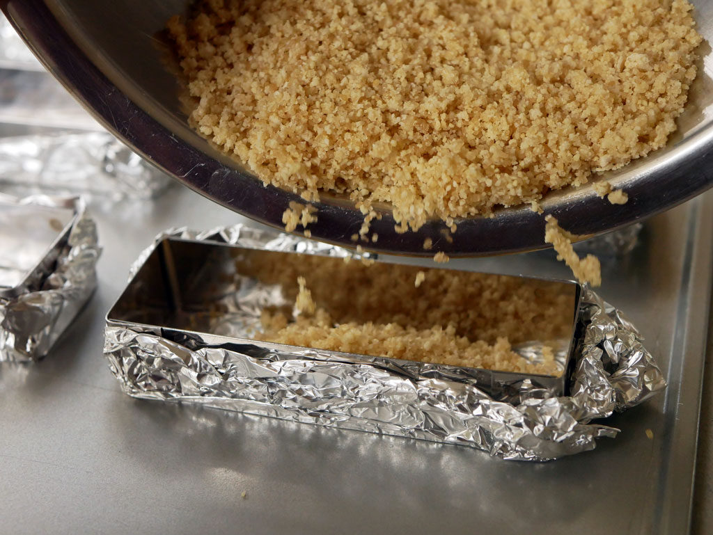 Preparing the cakes for baking